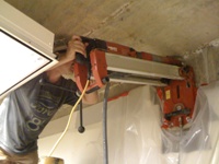 Diamond core drilling into vault wall