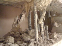Drilled vault wall opening for infrastructure lines