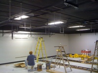 Ceiling-mounted lights and rack supports