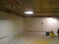 Lag bolt and support work inside the vault room